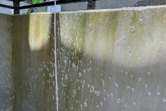 Pretreating concrete wall before full power wash – Burnaby